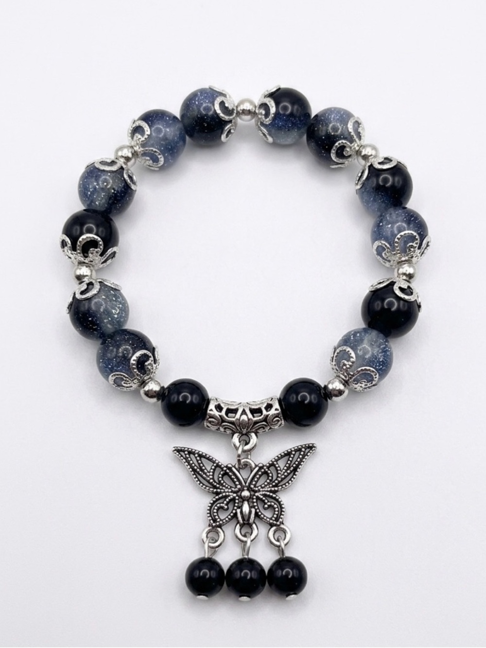Hand Crafted Blue and Black Beaded Bracelet with Butterfly Charm